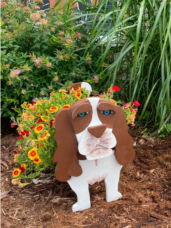 Dog planter with flowers